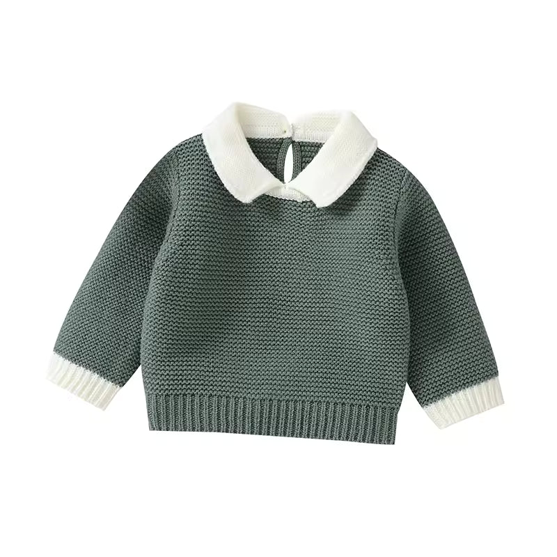 Green knitted sweater with white collar on