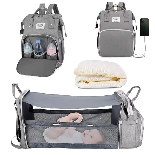 Diaper bag backpack with spacious compartments for bottles, diapers, and wipes